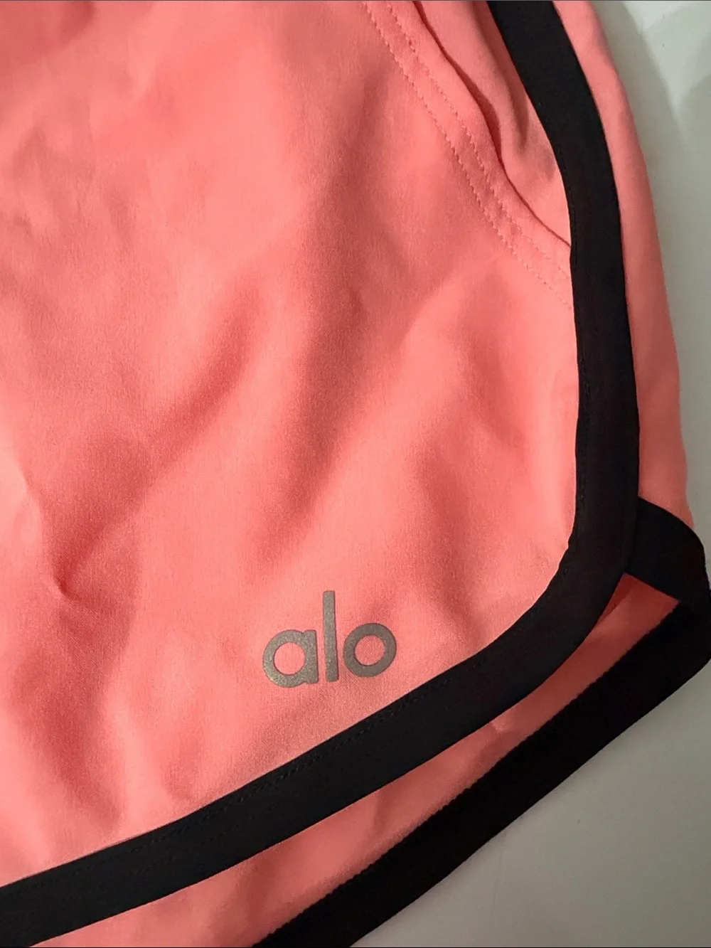 ALO Yoga Coral-Pink Ivy League Dolphin Athletic Shorts with Black Trim